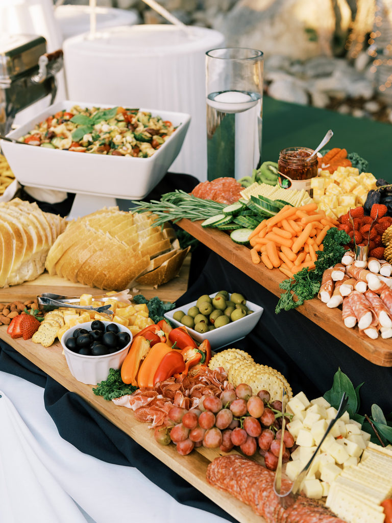 wedding reception charcuterie spread for Summer backyard wedding reception in Alpine, Utah | Photographed by Utah Wedding Photographer Alora Lani, a fine art photographer based out of Southern California and Utah